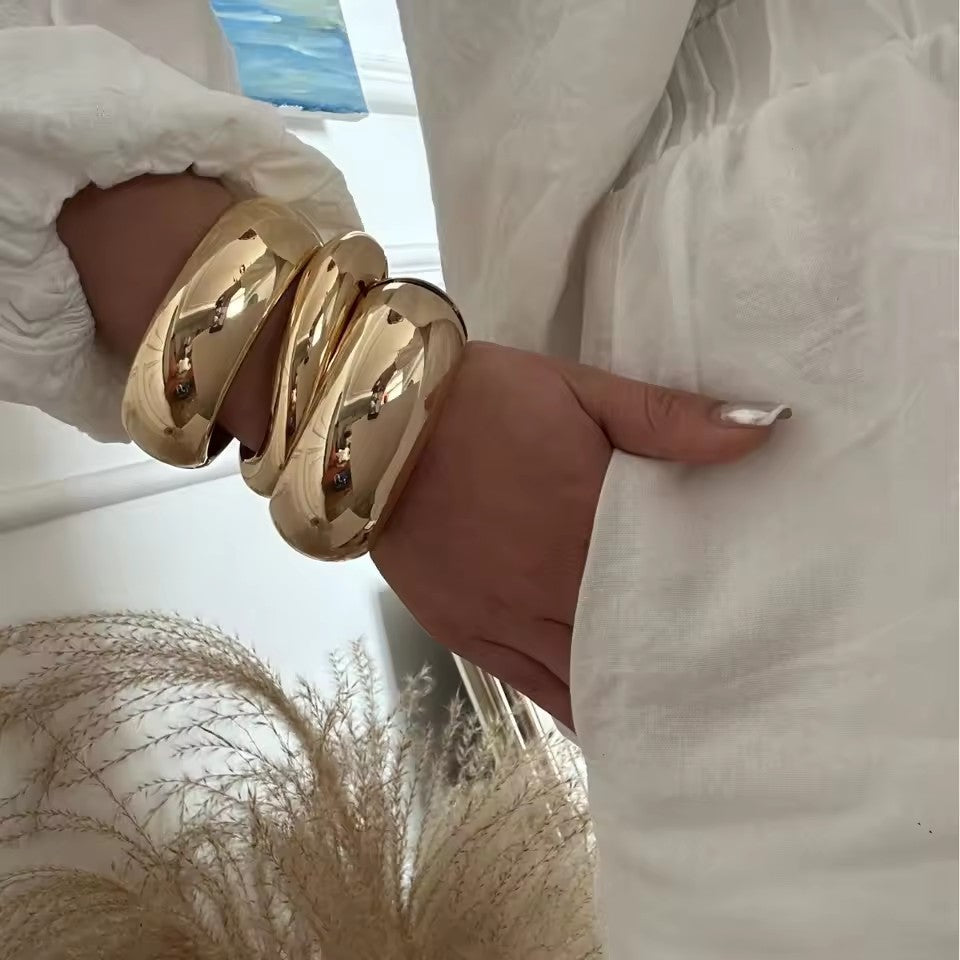  Exaggerated Smooth Irregular Wide Spring Bangles for Women