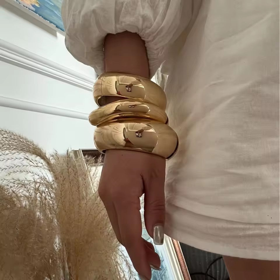  Exaggerated Smooth Irregular Wide Spring Bangles for Women